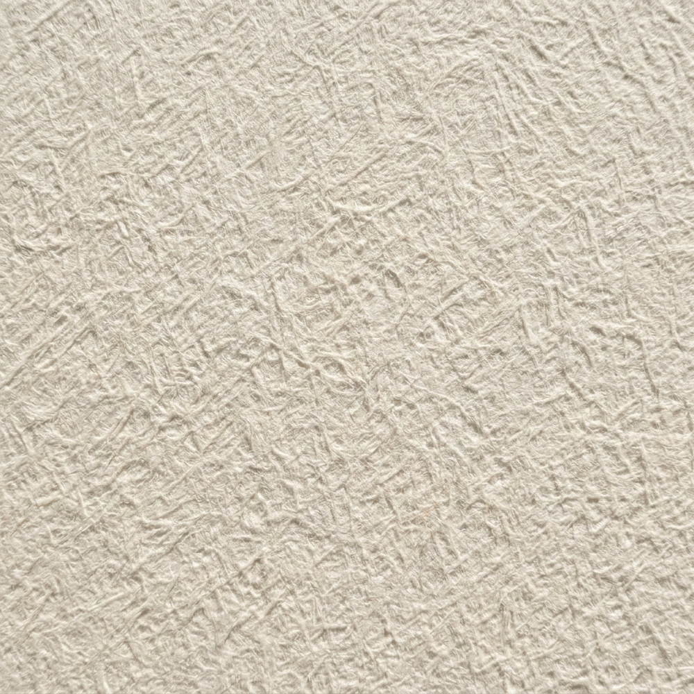 Close cotton watercolour paper in raking light