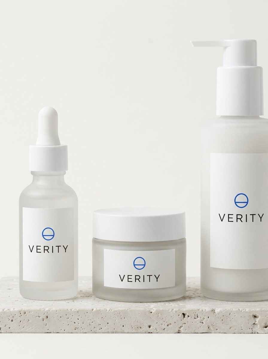 Demo photograph of three unbranded skincare bottles in a row